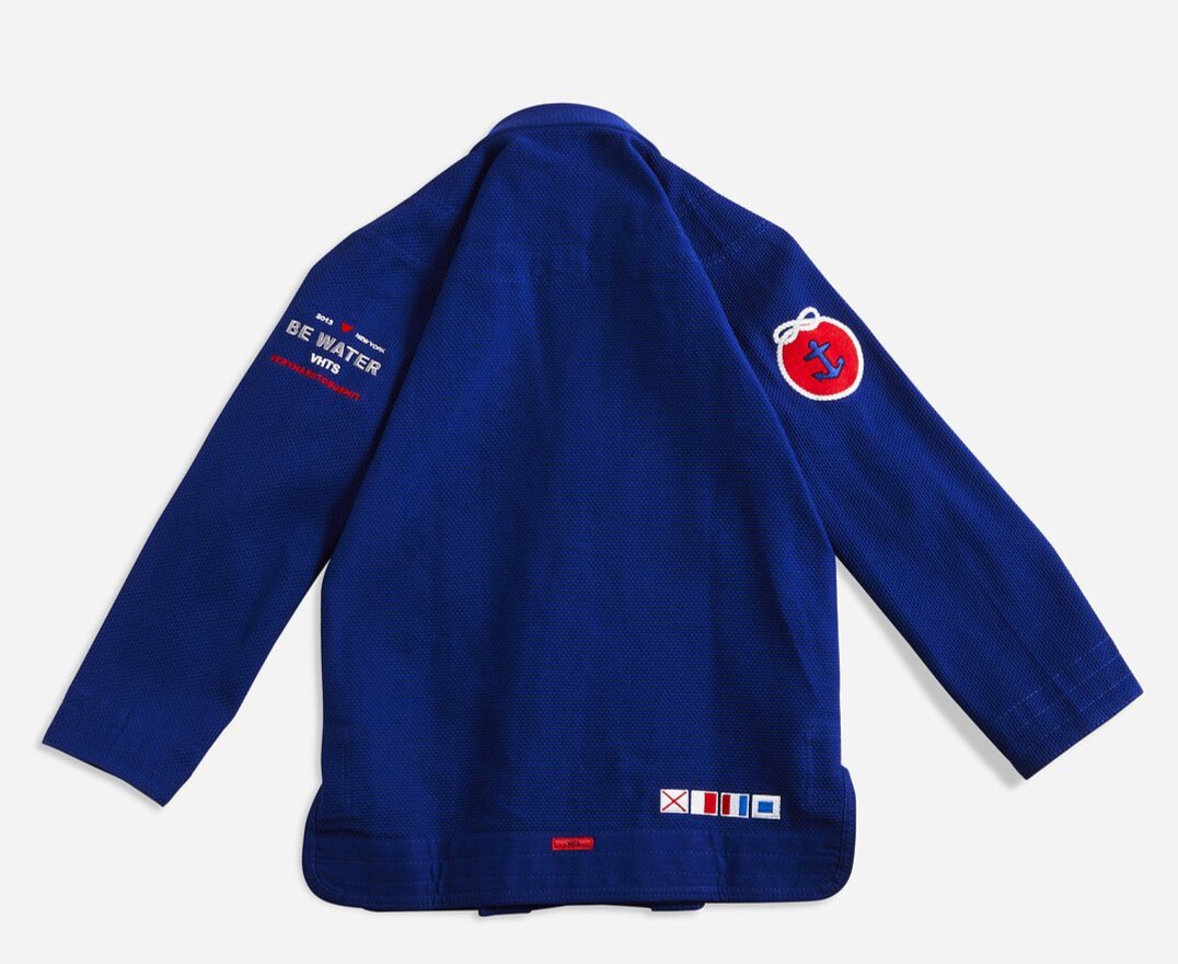 BE WATER 3.0 blue THIS IS THIRD DESIGN OF BE WATER KIMONO SERIES NEW DESIGN CAME OUT GREAT MAINTAINING ORIGINAL DESIGN CONCEPT YET INTRODUCING MODERN CUT WITH EDGY AND HIGH QUALITY PATCHES AND LABELS. JACKET: 450 GSM PEARL WEAVE EVA FOAM LAPEL WIDE REINFORCEMENT TAPE ROUND SIDE SLIT FINISH RUBBER LABEL PANTS: 11 OZ COTTON RIP STOP 6 BELT LOOP SYSTEM ROUND DRAW STRING RAISED BACK WIDE REINFORCEMENT TAPE RUBBER LABEL vhts europe
